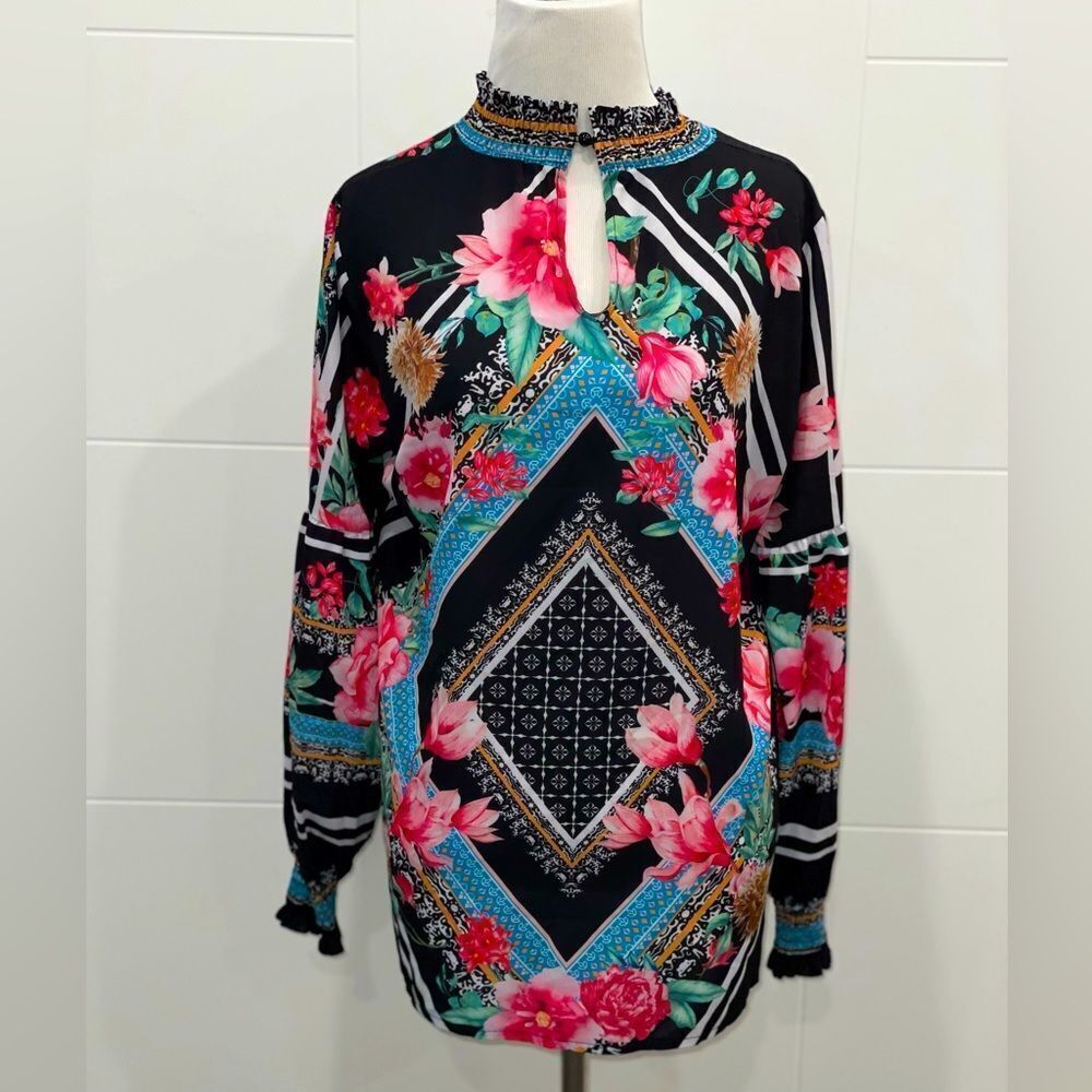 Long sleeve floral blouse with peep hole